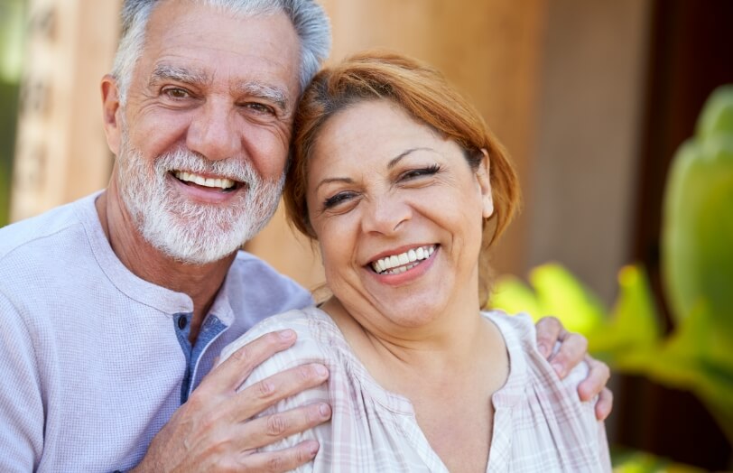 couple showing off their clean smiles after visiting Bonnie View Dental